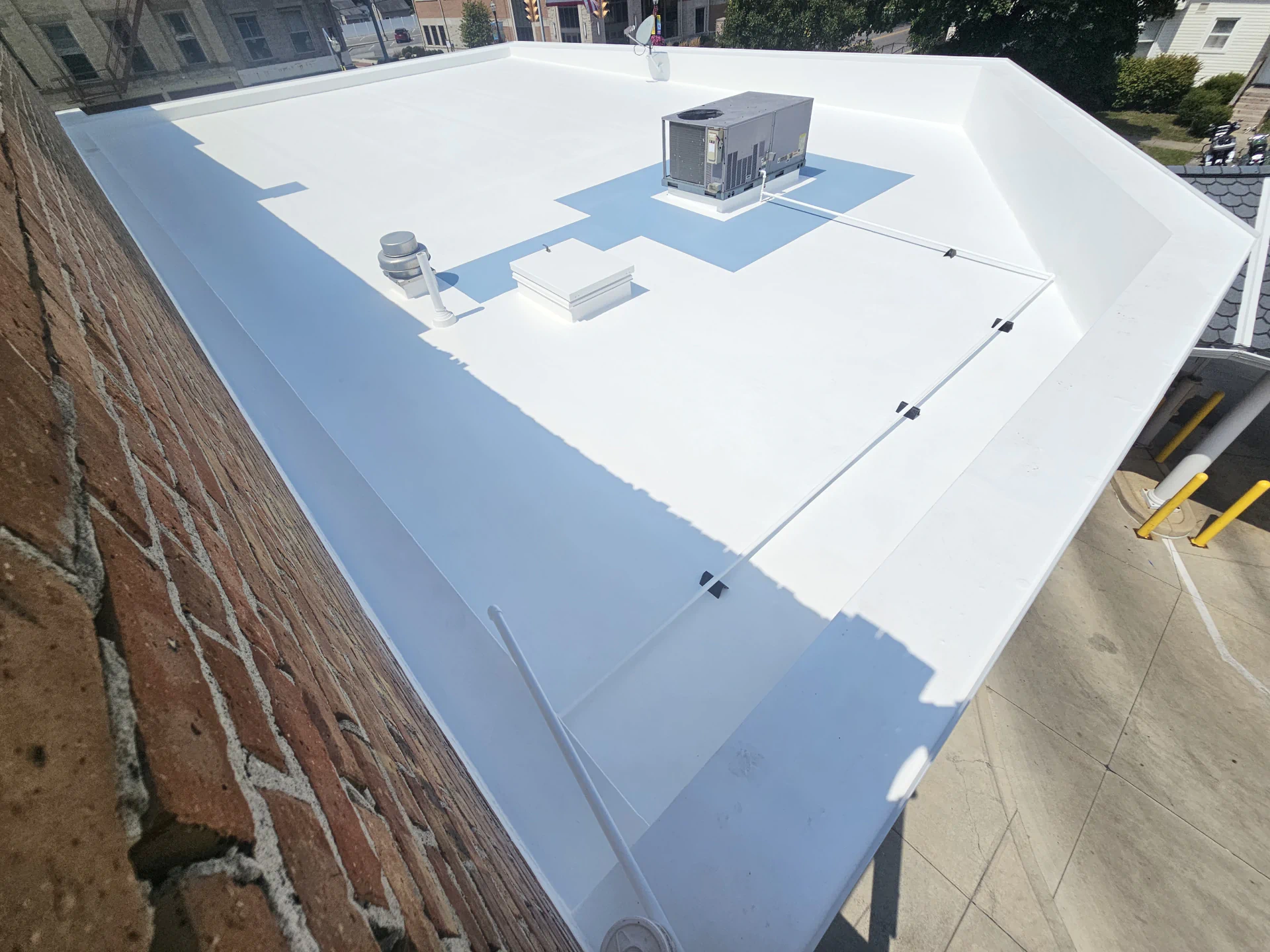 Preserve Your Columbus, OH Property with Advanced Flat and Metal Roofing Solutions